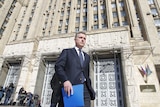 Australian ambassador to Russia Peter Tesch leaves the Russian foreign ministry building in Moscow.