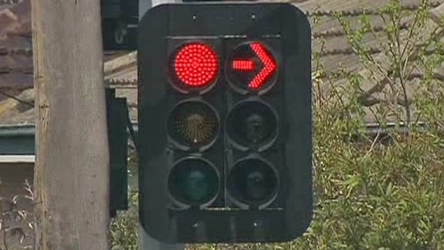 VicRoads admits the timing of amber lights at eight sites was wrong.
