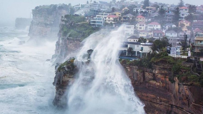 Wild weather lashes the cliff face at Vaucluse, Sydney