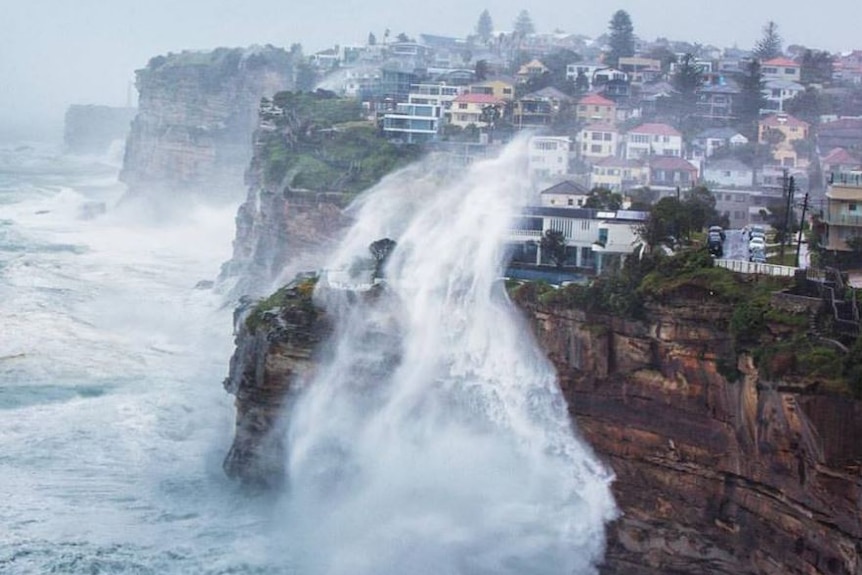 Wild weather lashes the cliff face at Vaucluse, Sydney