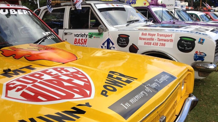 Cars from the Variety Club Bash line-up in Newcastle's Civic Park in honour of Senior Constable Tony Tamplin.