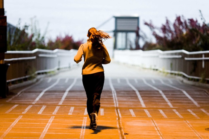 Woman running from behind