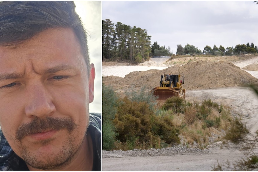 A man with brown hair and a moustache on the left and above ground at a mine with piles of dirt and machinery. 