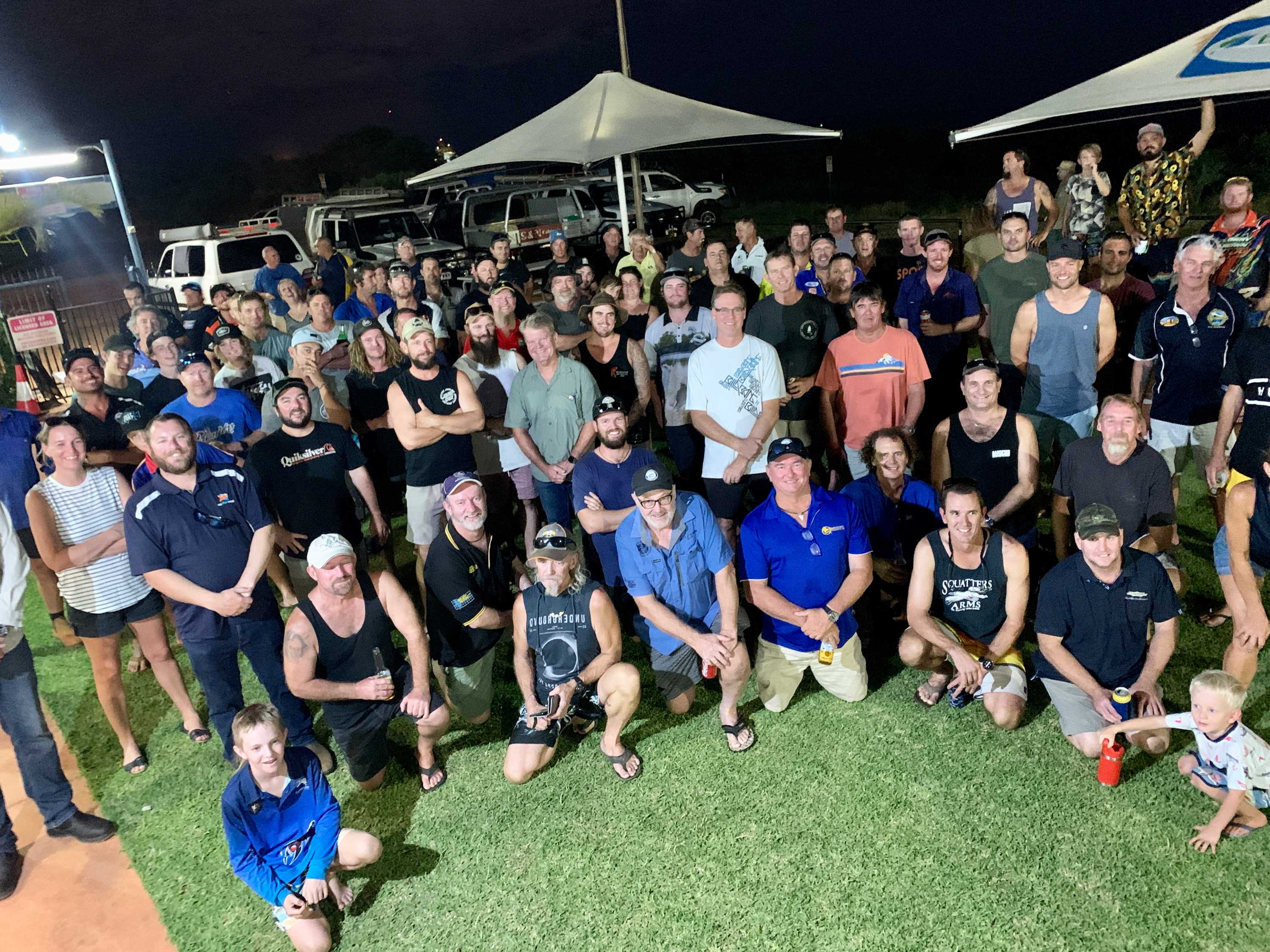 A large group of mostly men.