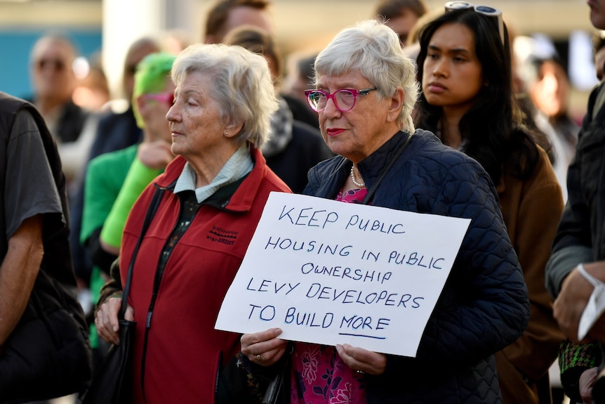 two elderly women at a rally for social public housing in sydney