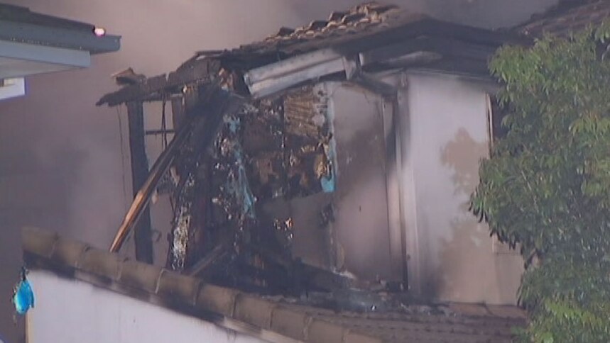 TV still of townhouse destroyed by fire at Runcorn in December 2012. Entered March 4, 2014