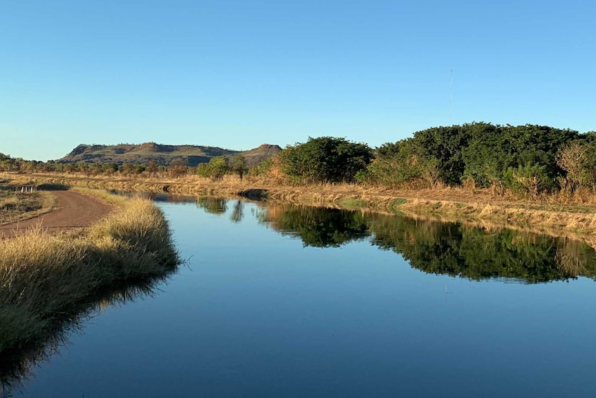 Still irrigation channel in the afternoon light