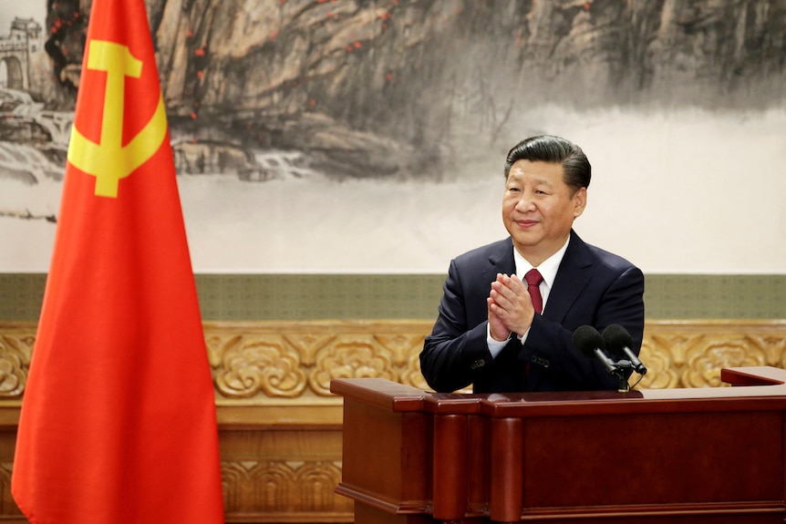 Chinese President Xi Jinping clapping