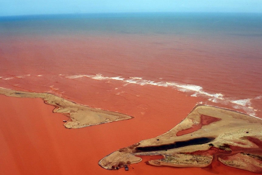 The Doce River in Brazil flooded with toxic mud