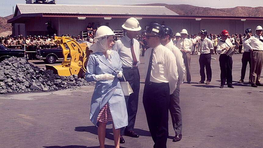 Queen Elizabeth II and Duke with Ken Finlay inspecting machinery, 1970.