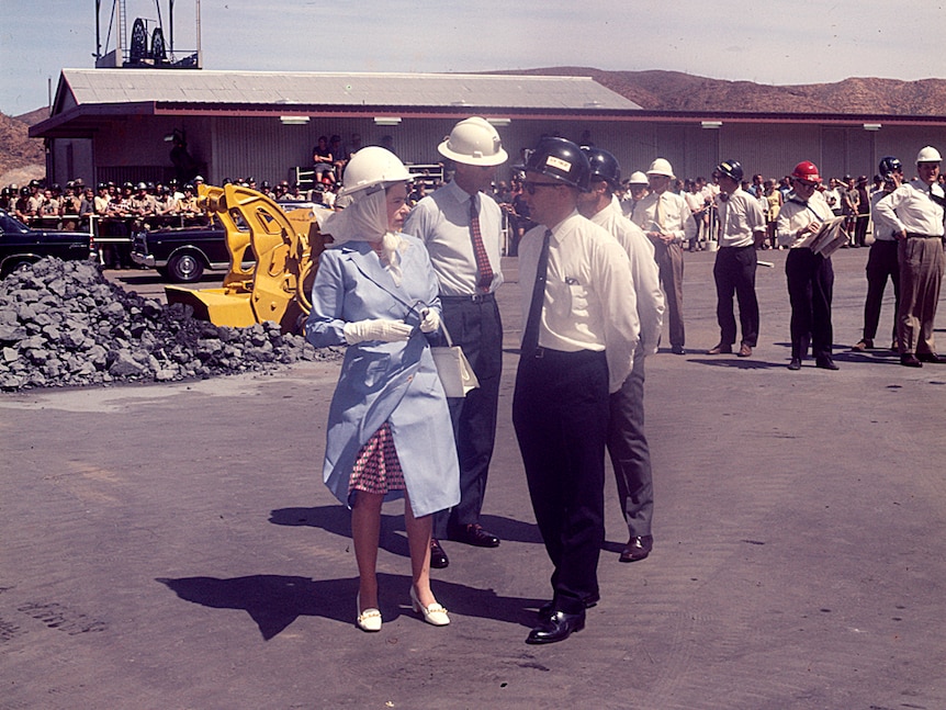 Queen Elizabeth II and Duke with Ken Finlay inspecting machinery, 1970.