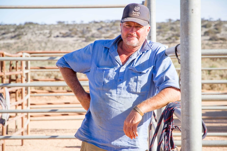 Founder of 4BP horses Joes Hughes stands in the yards at Mundrabilla Station.