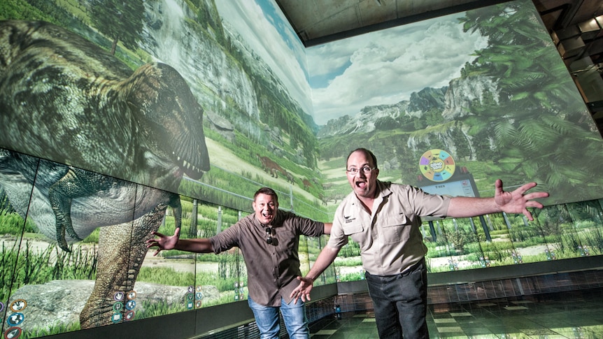 Studio manager Sean Druitt and Dr Scott Hocknull running away from digital dinosaurs.