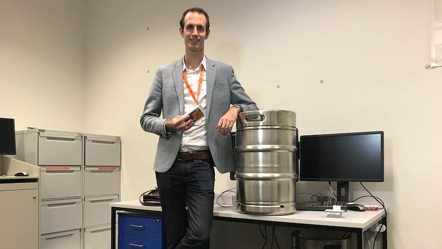 Creator of Binary Beer, Michael Burton, a device that tracks how much beer is left in a keg.