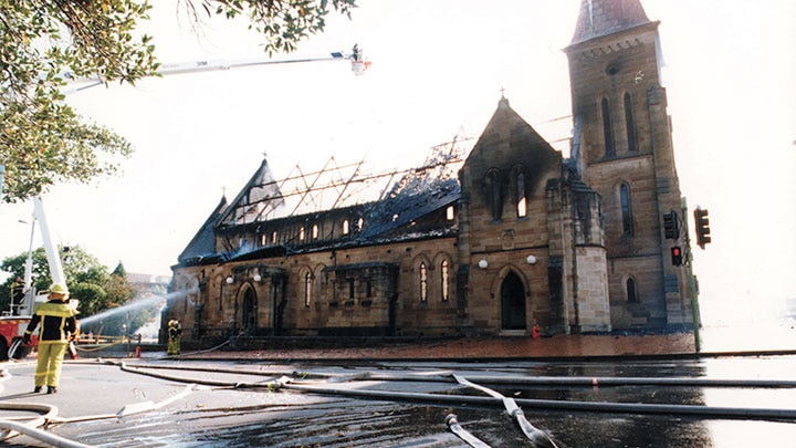 Firefighters put out flames at St Patrick's Cathedral in Parramatta in 1996