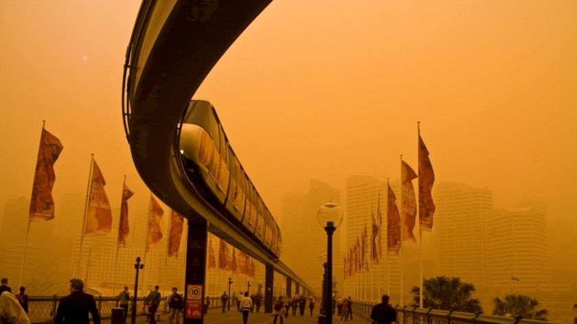 Darling Harbour is blanketed with dust during a dust storm in Sydney on September 23, 2009.