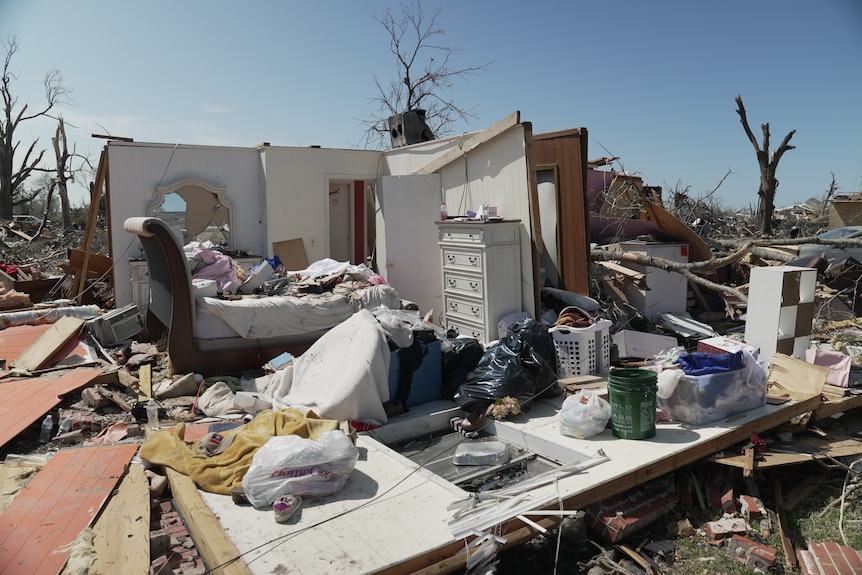 A room of a house ripped open by a tornado 