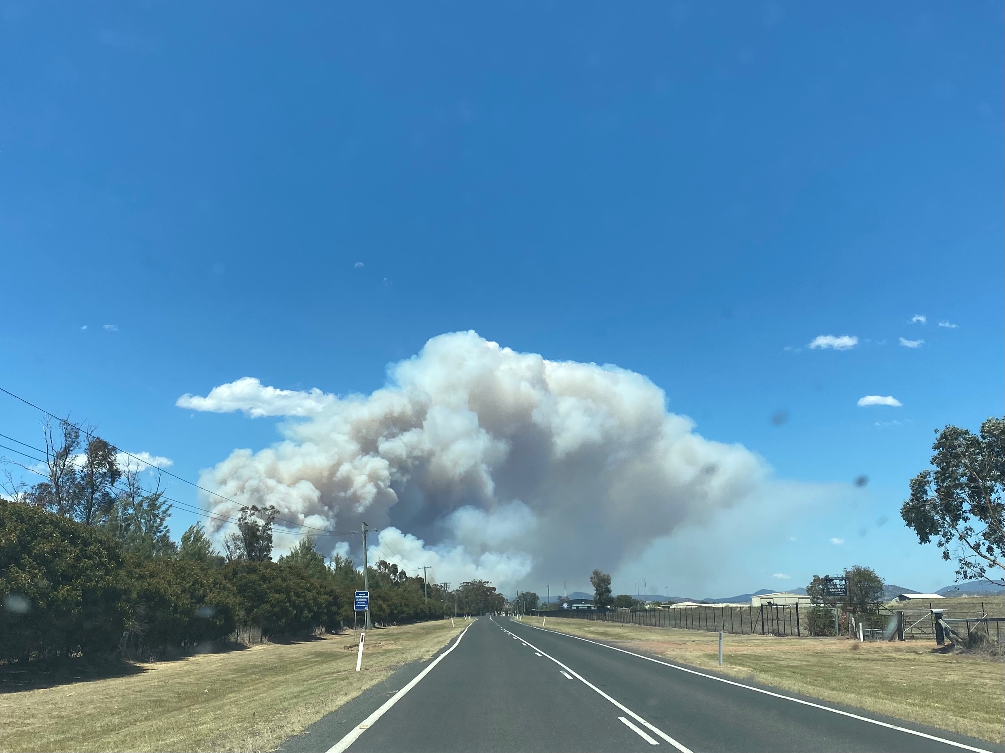 Smoke billowing near a road in the NSW Upper Hunter
