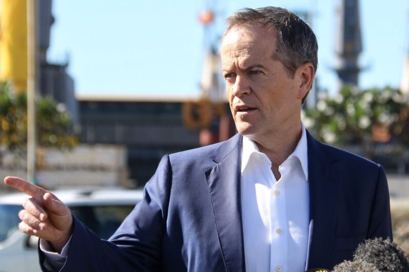 Bill Shorten points during a press conference in Qld today.
