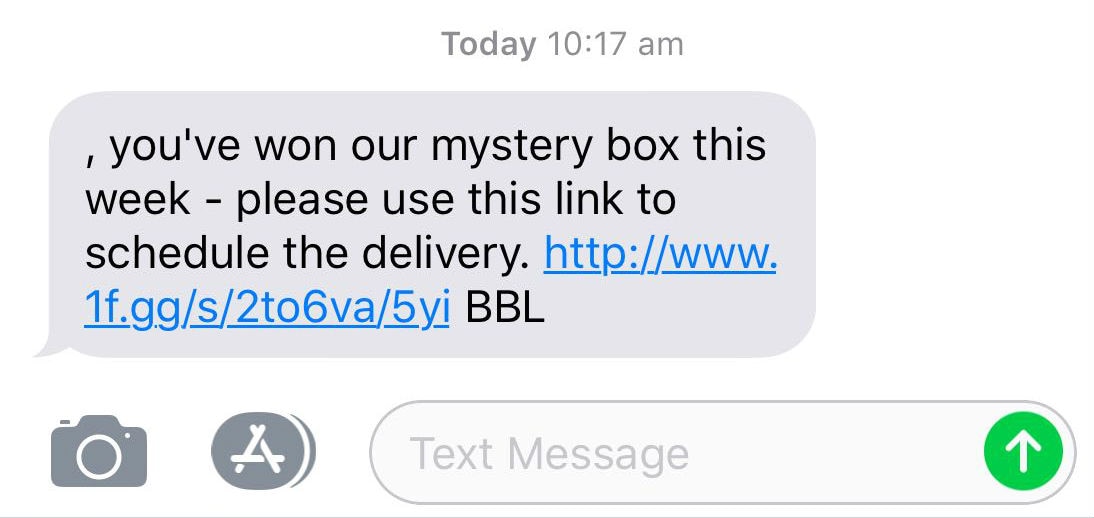 A scam text message that reads: "you've won our mystery box this week", and encourages the reader to click a link.