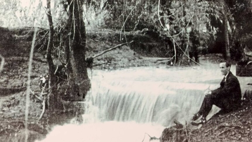 John Balfour beside Tuggeranong Creek