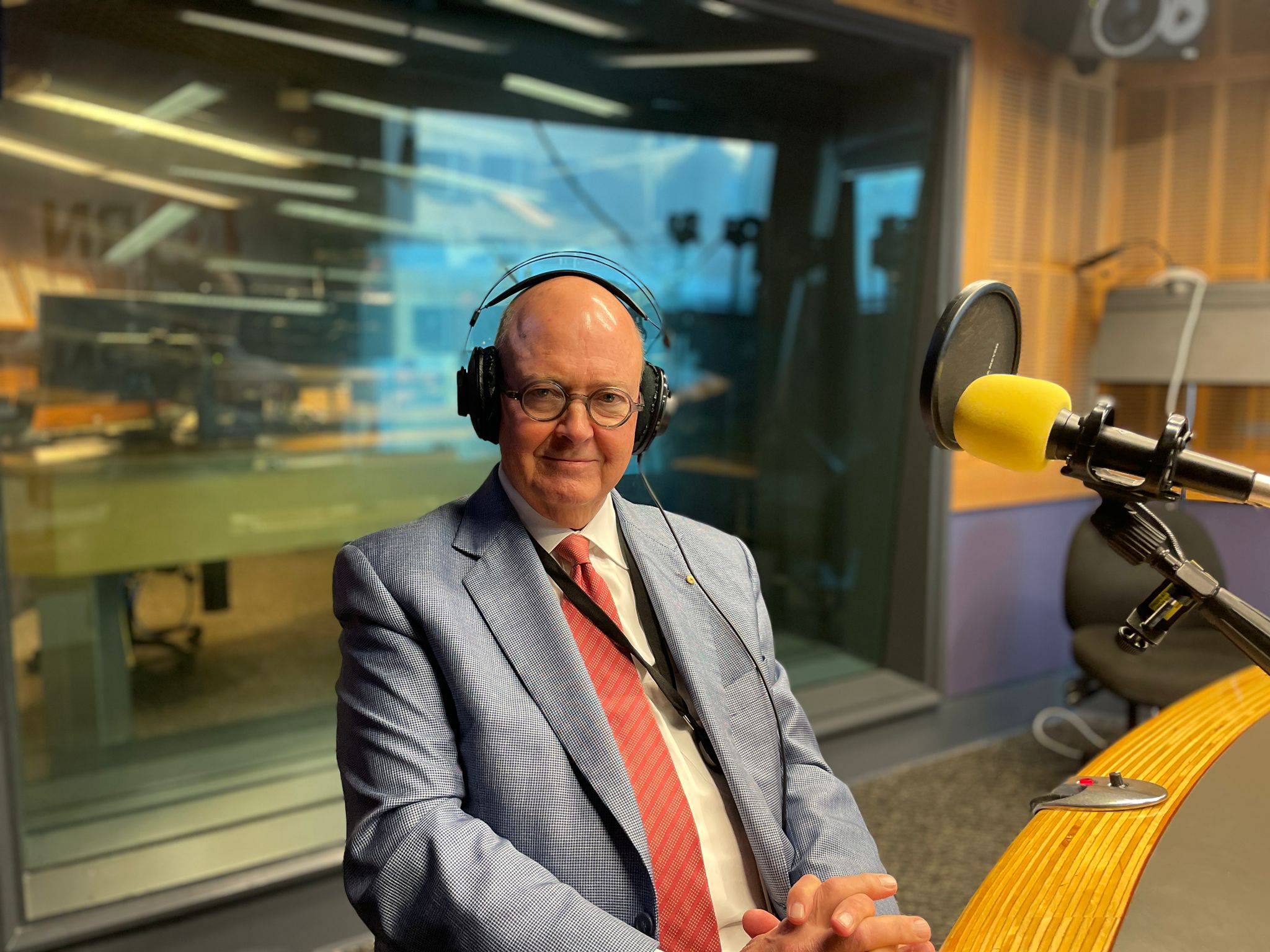 Kim Williams in a radio studio.