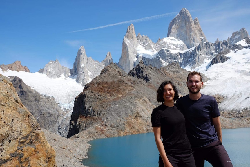 Tom Graue and Mei-Lin Schwarz, pictured in front of a volcano.