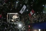 Pope Francis greets huge crowds at Copacabana Beach