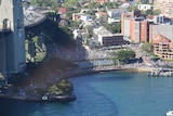 Aerial view of crowds packed along the Sydney foreshore at Kirribilli for the fireworks.