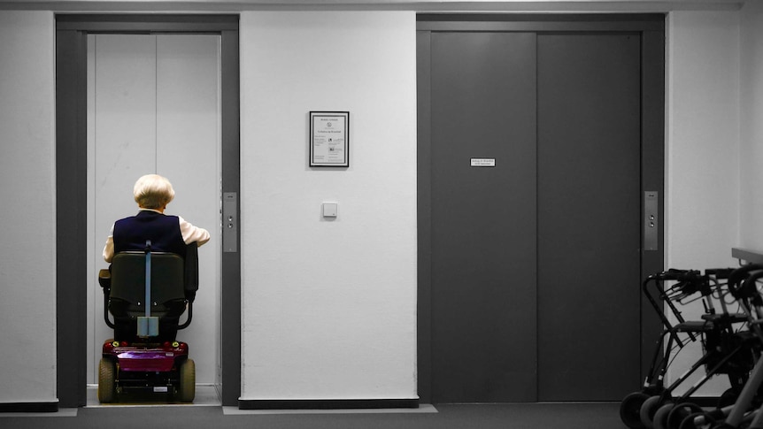 Women enters an elevator