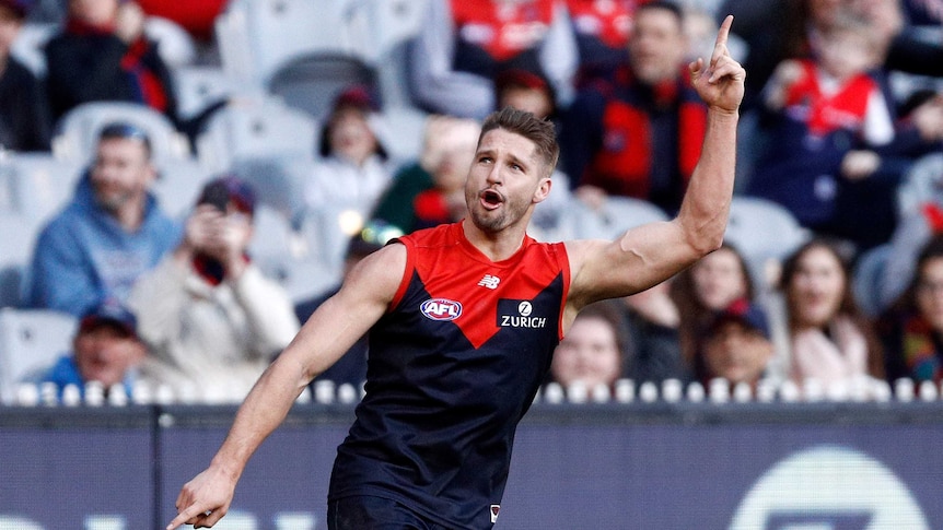 Jesse Hogan celebrates a goal for Melbourne against Gold Coast