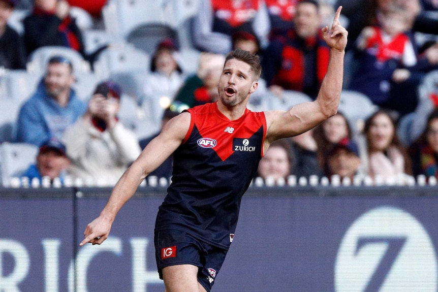 Jesse Hogan of the Demons celebrates a goal against Gold Coast at the MCG.