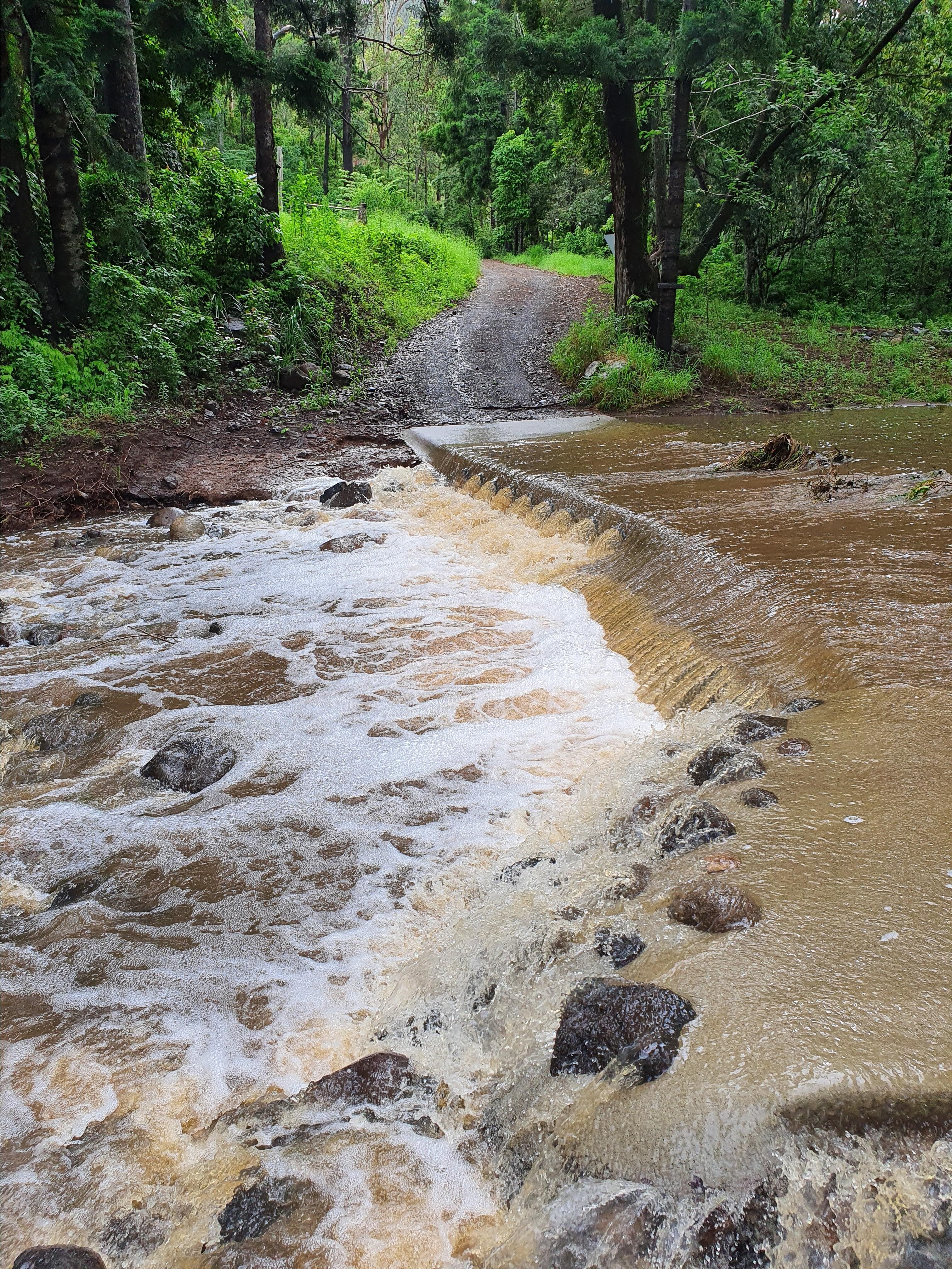 Heavy rain pauses in Queensland, but BOM predicts more storms next week