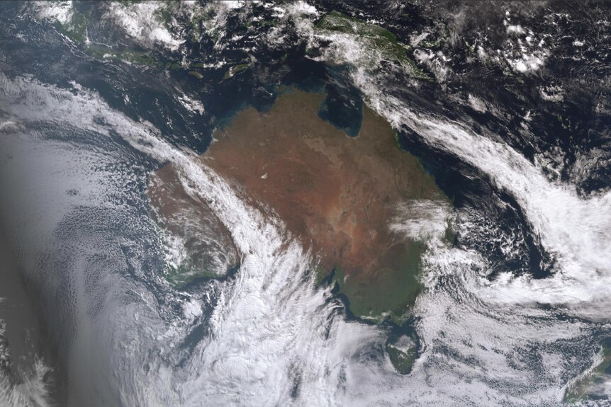 satellite images showing two diagonal stripes of cloud crossing Australia
