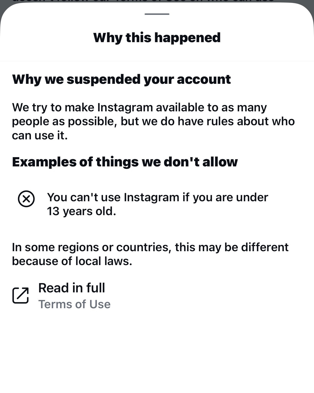 A screengrab of an Instagram notification telling her 'why her account has been suspended' 