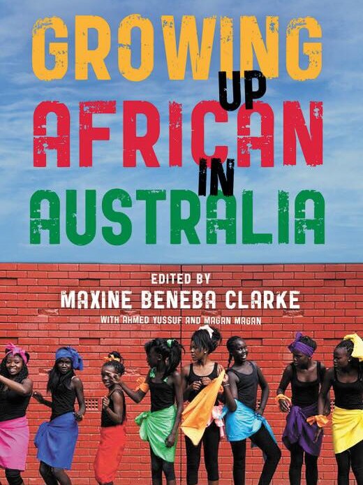 Book cover of 'Growing up African in Australia' featuring a group of African girls standing in a line, dancing