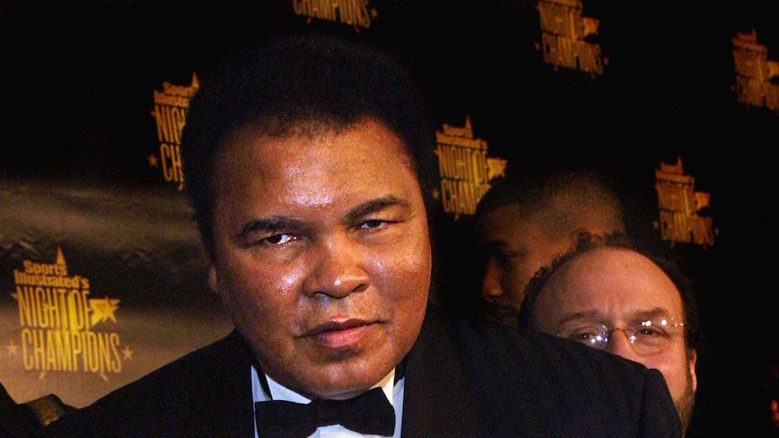 Muhammad Ali in a suit arrives for the taping of Sports Illustrated's Night of Champions