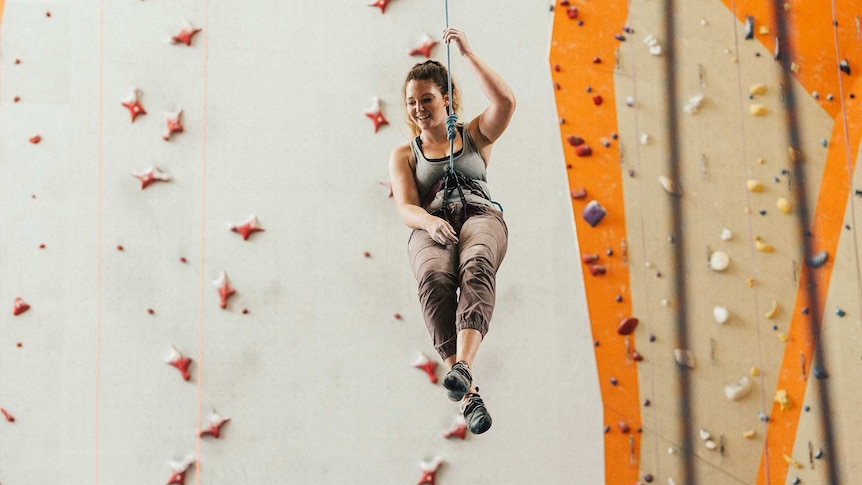 Woman at indoor climbing gym