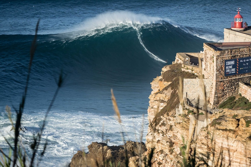 German surfer Sebastian Steudtner on a gigantic wave in Portugal