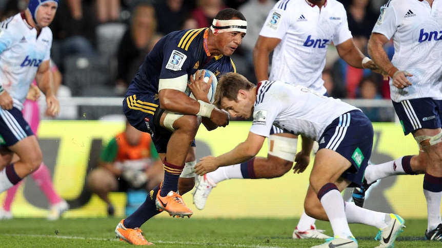 Upset win ... Nasi Manu makes a charge for the Highlanders