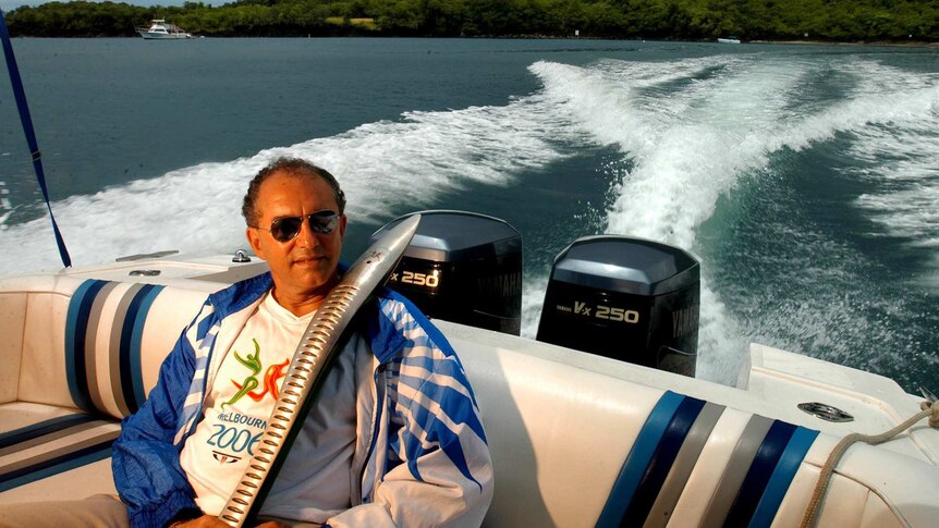 Richard Peterkin, President of St Lucia Olympic and Commonwealth Games Committee, on a speed boat