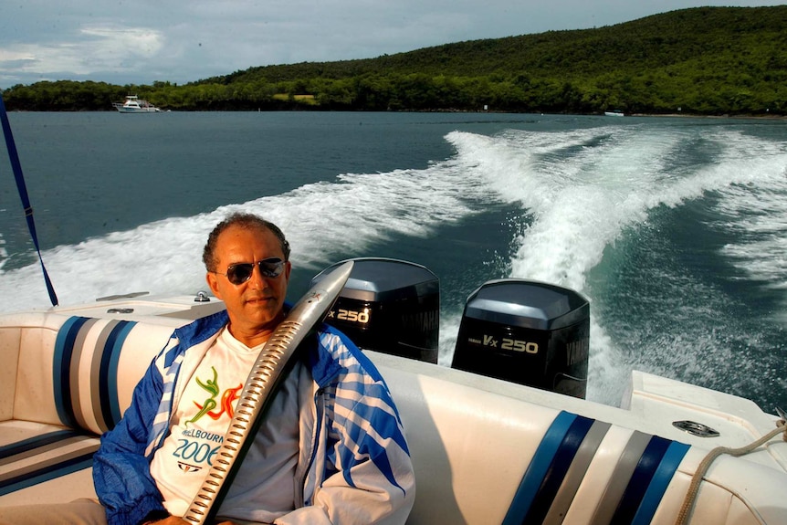 Richard Peterkin, President of St Lucia Olympic and Commonwealth Games Committee, on a speed boat