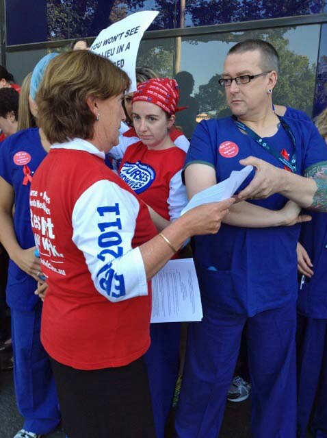 Lisa Fitzpatrick with a nurse at the Royal Melbourne Hospital.