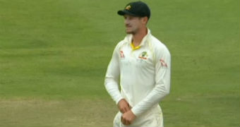 Cameron Bancroft shoves yellow tape down his pants in fear of being caught tampering with the ball.