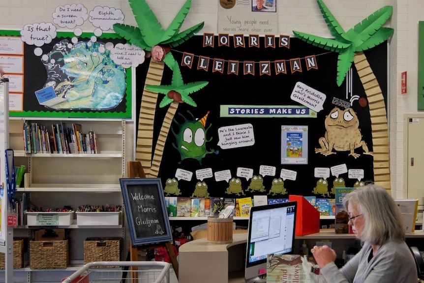 A close-up shot of a library sign which says 'reading every day matters'.