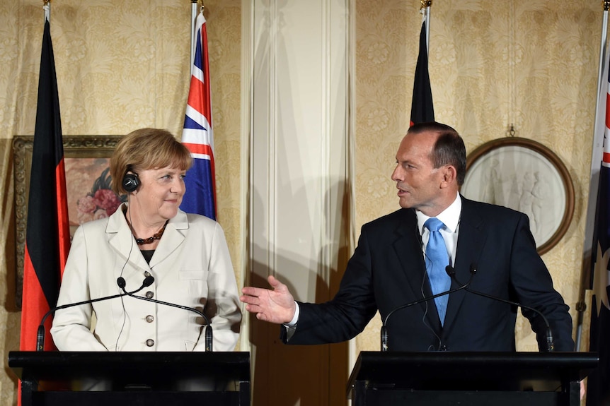 Tony Abbott and Angela Merkel speak at a press conference following the G20 summit.