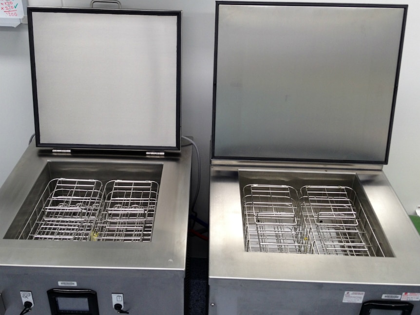 Two stainless steel machines side by side