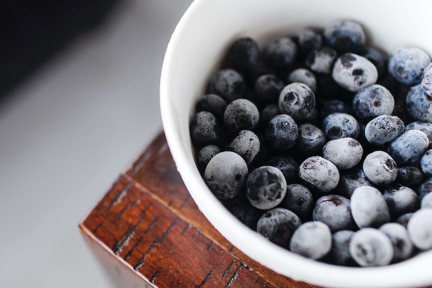 A bowl of frozen blueberries, kept in the freezer during the coronavirus.