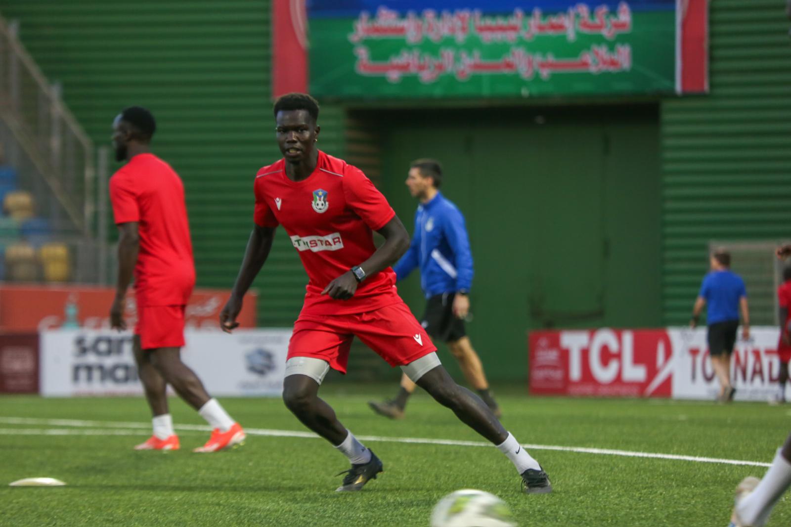 Valentino Yuel in action during football training in South Sudan