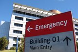 TV still of Emergency sign and front driveway of Princess Alexandra Hospital in Brisbane